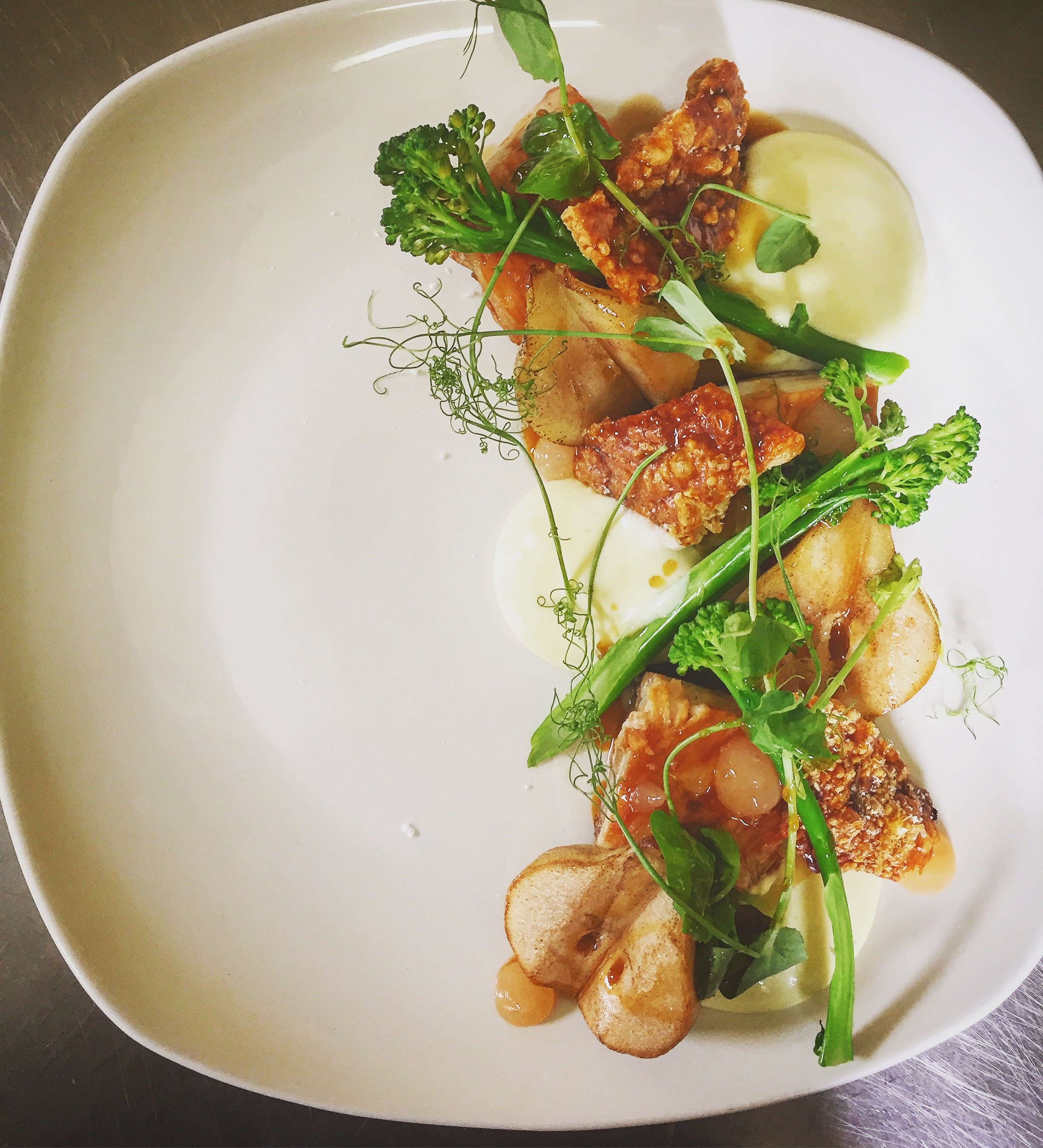 Slow cooked pork belly, pear, garlic pot