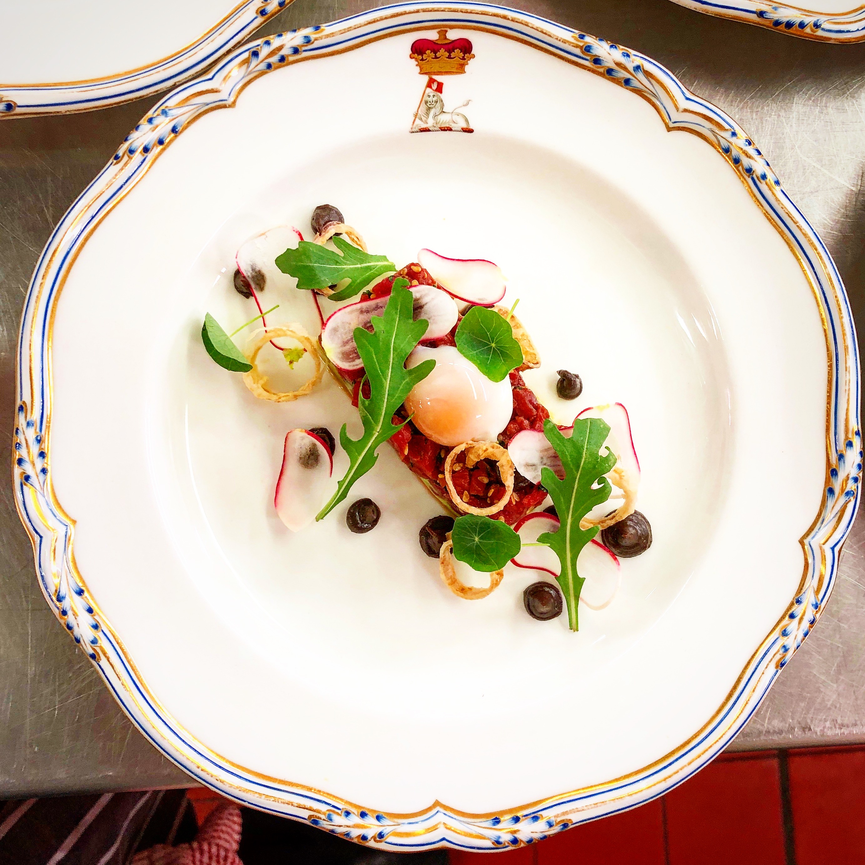 Beef tartare, black garlic, shallot ring