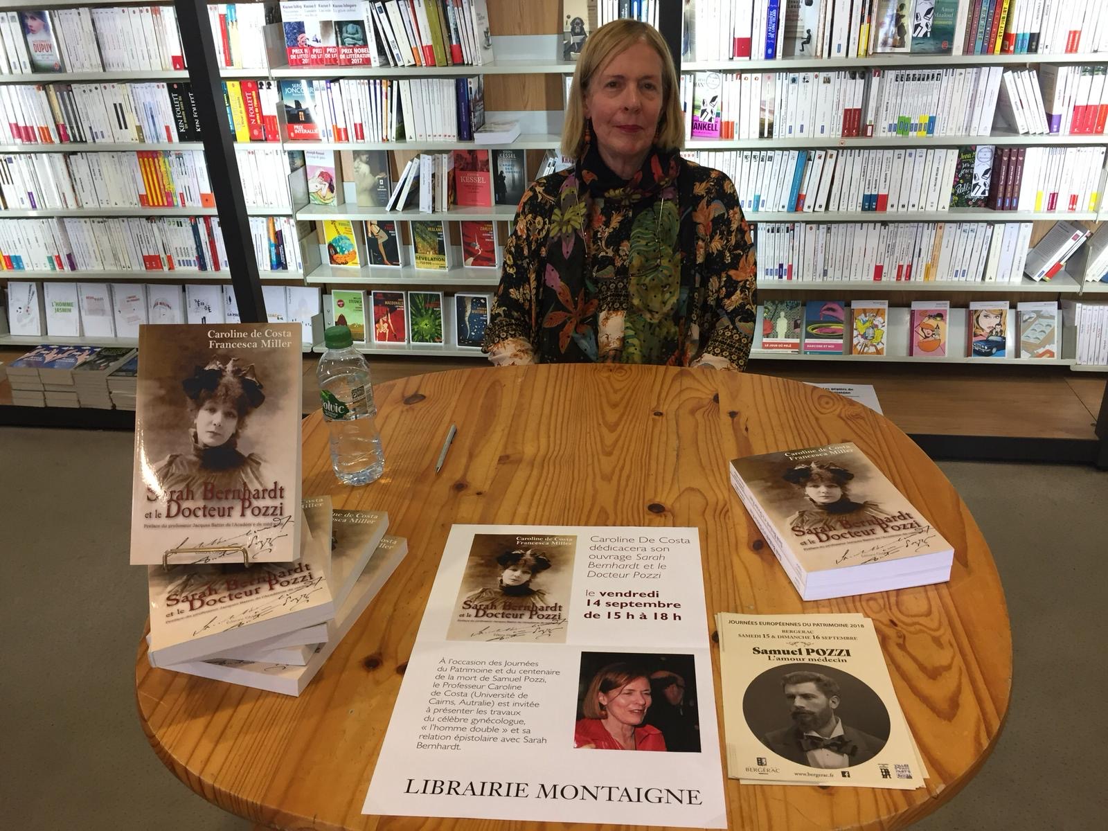 Caroline with copies of her book