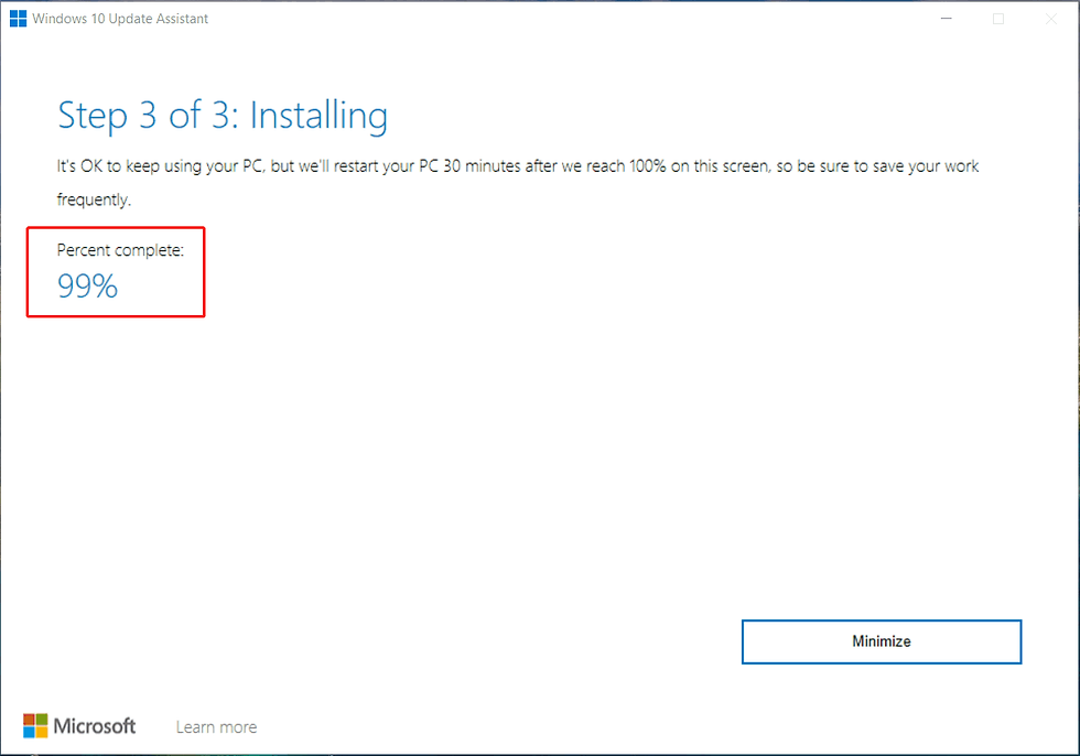 A Screenshot of Windows 10 Update Assistant stuck at 99% percentage