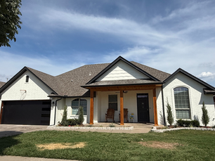 A view of the front after an exterior renovation from EBR Construction.