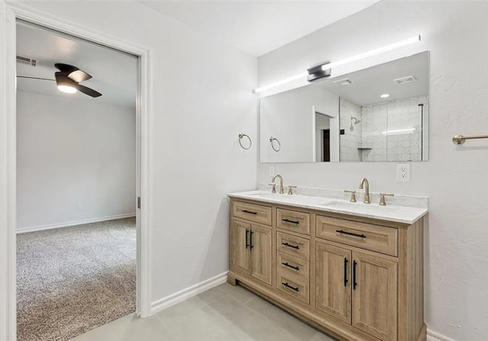 The vanity of the bathroom of the residential remodel by EBR Construction.