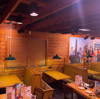 Finished booths are shown in the Texas Roadhouse Restaurant Remodel by EBR Construction.