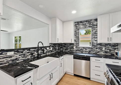 A detailed view of the kitchen remodel by EBR Construction.