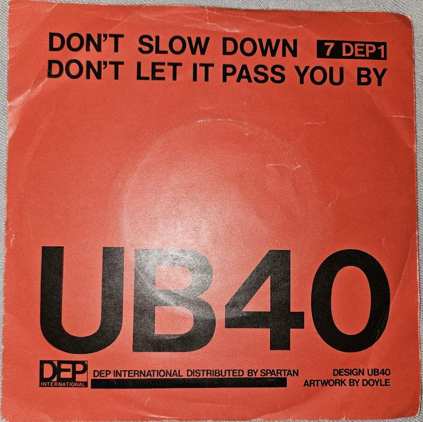 UB40 - Don't Slow Down / Don't Let It Pass You By (7", Single) (DEP Internationa