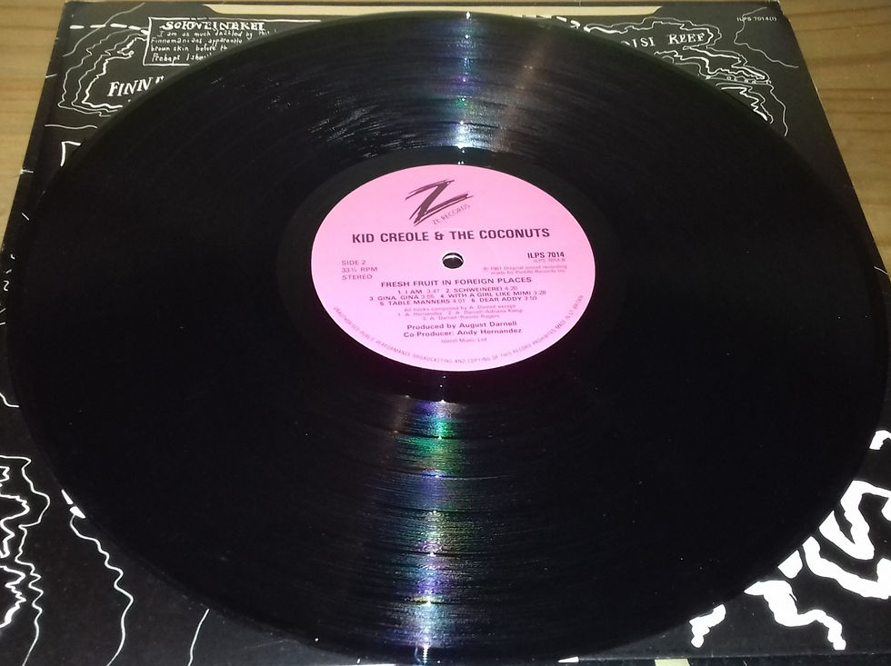ภาพขนาดย่อ: Kid Creole And The Coconuts - Fresh Fruit In Foreign Places (LP, Album) (ZE Reco