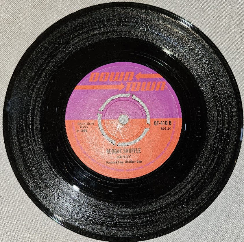 Thumbnail: Dandy* - Reggae In Your Jeggae (7", Single, 4 P) (Downtown (4))