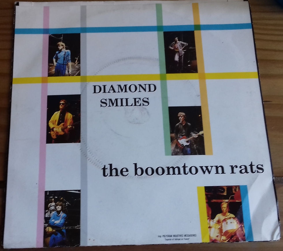 ภาพขนาดย่อ: The Boomtown Rats - Diamond Smiles (7", Single) (Ensign)