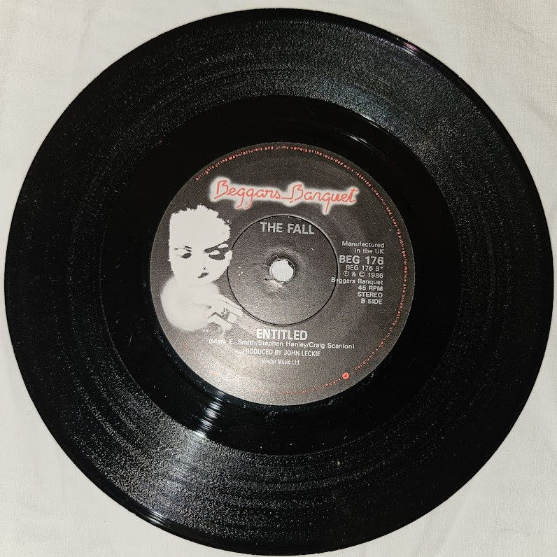 Miniatyrbild: The Fall - Hey! Luciani (7", Single) (Beggars Banquet)