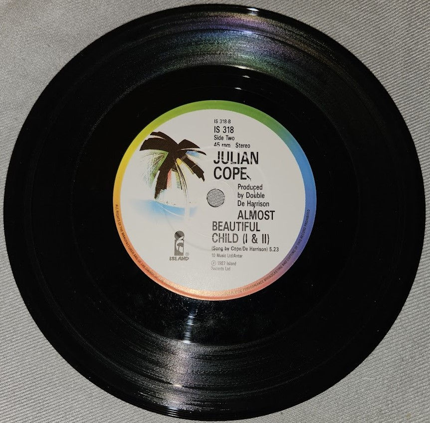 Miniatura: Julian Cope - Eve's Volcano 'Covered In Sin' (7", Single) (Island Records)