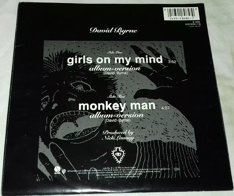 Miniature : David Byrne - Girls On My Mind (7", Single) (Sire, Luaka Bop, Warner Bros. Recor