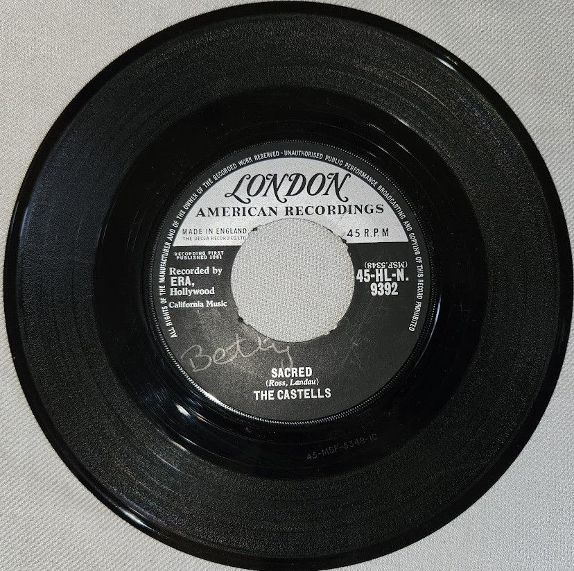 The Castells* - Sacred / I Get Dreamy (7", Single) (London Records, London Ameri