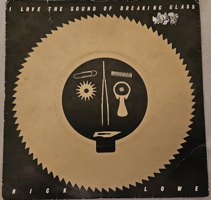 Nick Lowe - I Love The Sound Of Breaking Glass (7", Single, Sol) (Radar Records