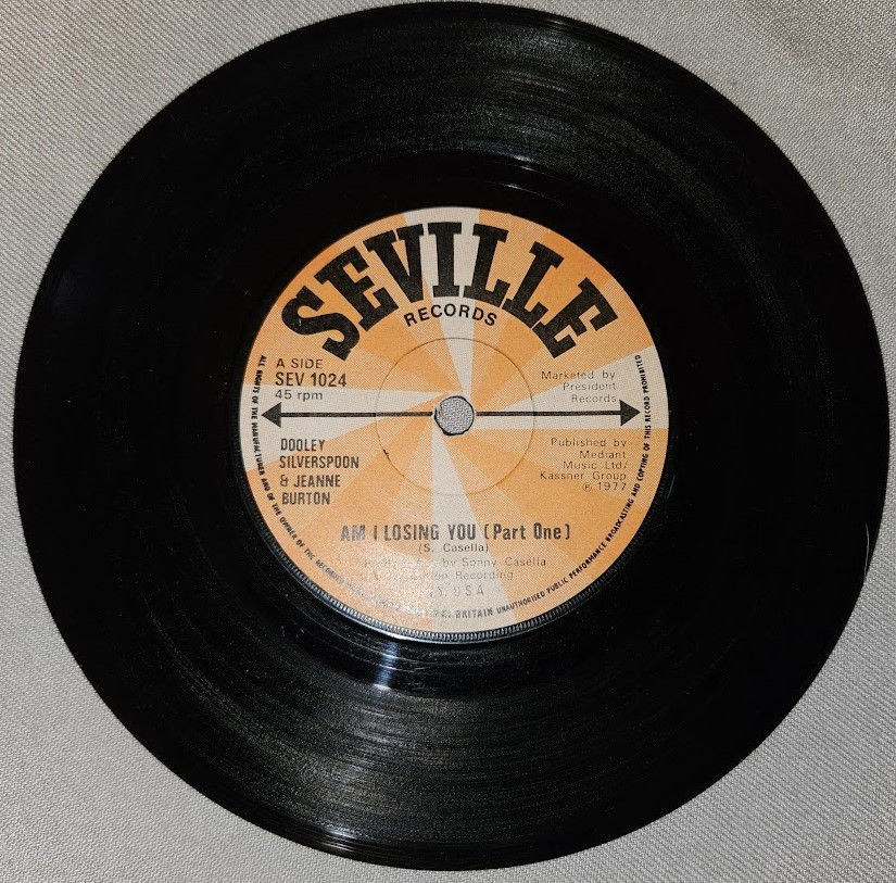 Dooley Silverspoon & Jeanne Burton* - Am I Losing You (7", Single) (Seville Reco