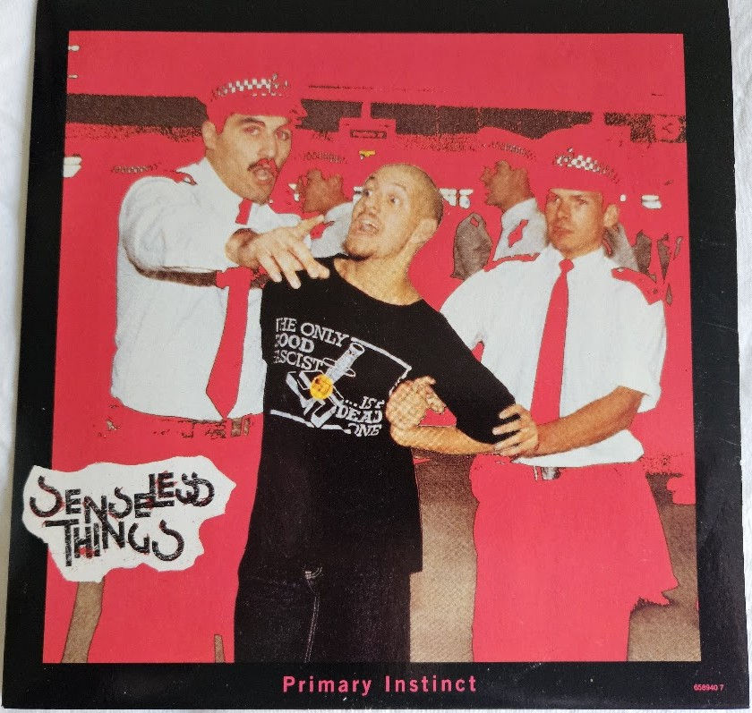 Senseless Things - Primary Instinct (7", Single, Pin) (Epic)
