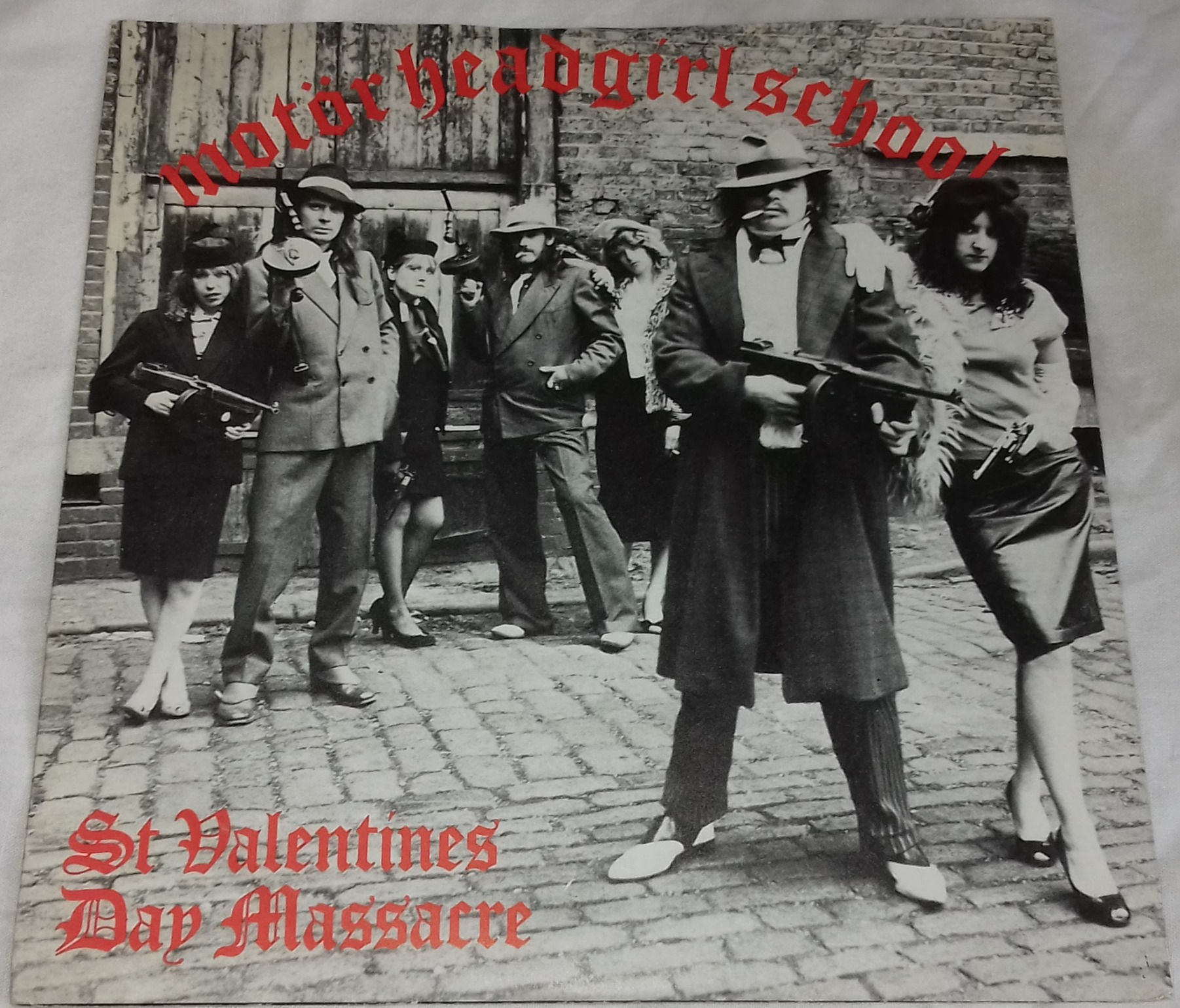 Motörhead / Girlschool - St. Valentines Day Massacre (7", EP, Single, Inj) (Bron