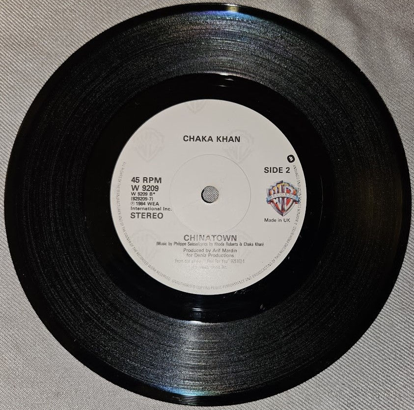 Miniatura: Chaka Khan - I Feel For You (7", Single, Pap) (Warner Bros. Records, Warner Bros