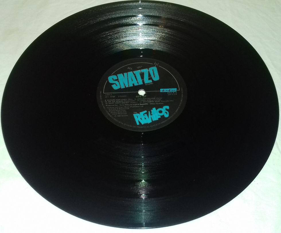 ภาพขนาดย่อ: The Revillos - Rev Up (LP, Album) (Dindisc, Snatzo Recordi)