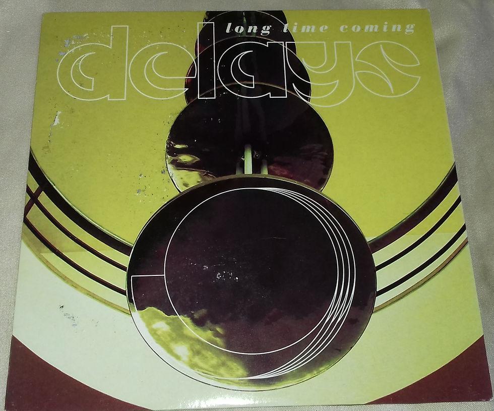 Delays - Long Time Coming (7", Single, Gol) (Rough Trade)