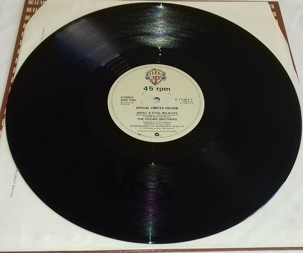 ภาพขนาดย่อ: The Doobie Brothers - What A Fool Believes (12", Single, Ltd, Ge) (Warner Bros.