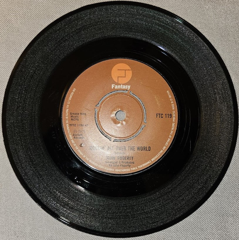 John Fogerty - Rockin' All Over The World (7", Single) (Fantasy)
