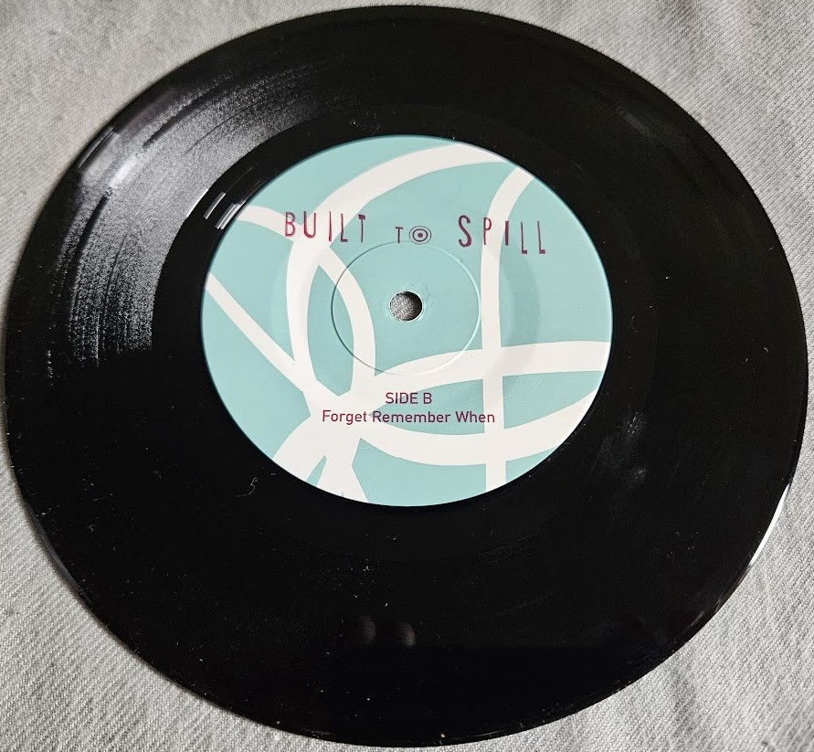 Thumbnail: Built To Spill - Center Of The Universe (7", Single) (City Slang)