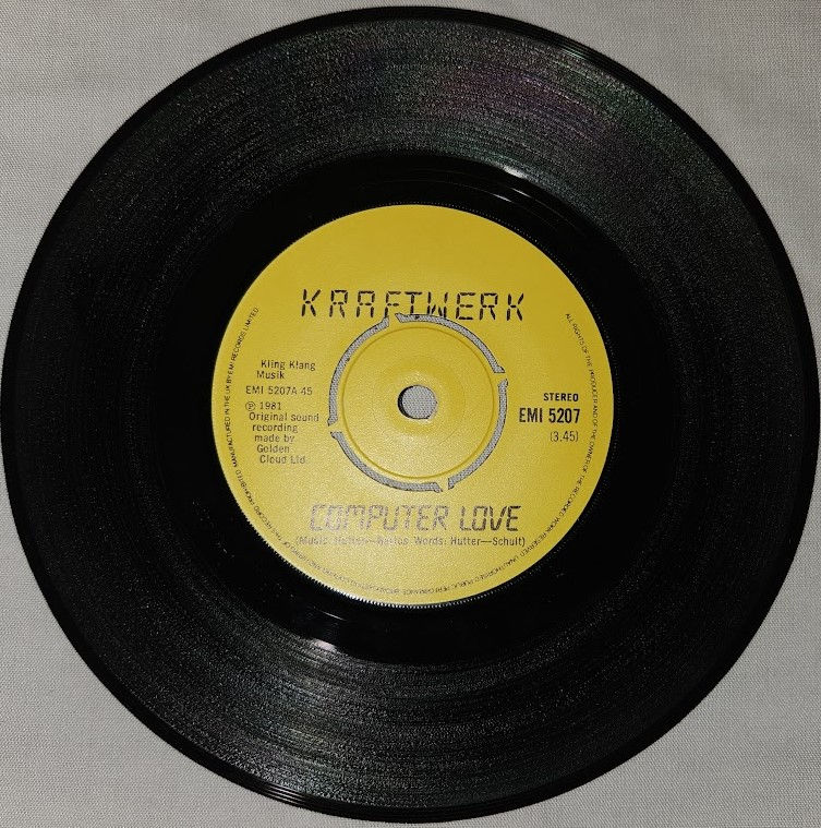 תמונה ממוזערת: Kraftwerk - The Model / Computer Love (7", Single, Pus) (EMI)