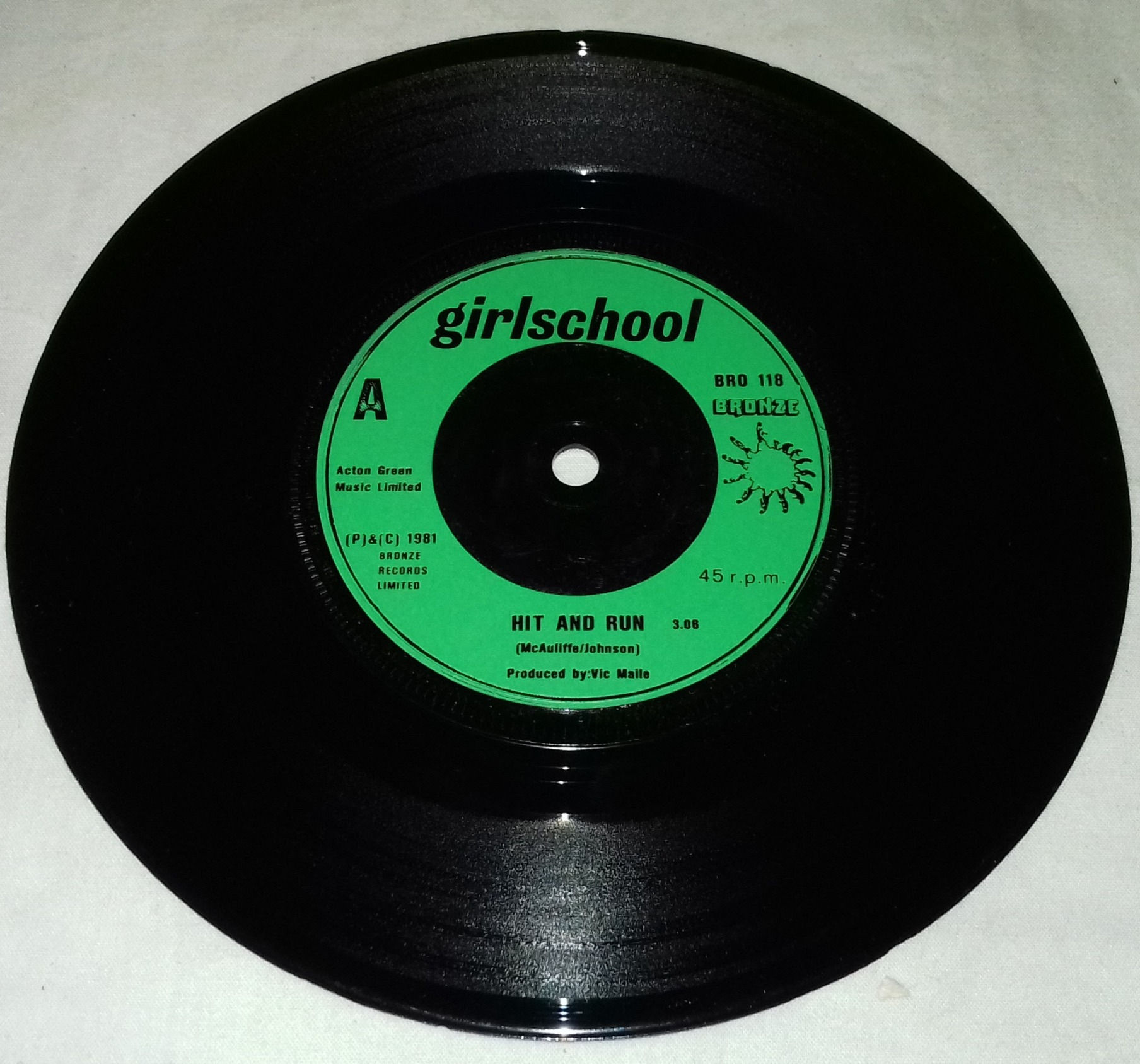 Girlschool - Hit & Run (7", Single) (Bronze)