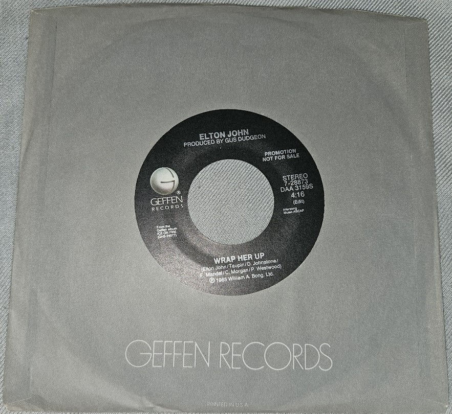 Elton John - Wrap Her Up (7", Single, Promo, Spe) (Geffen Records)