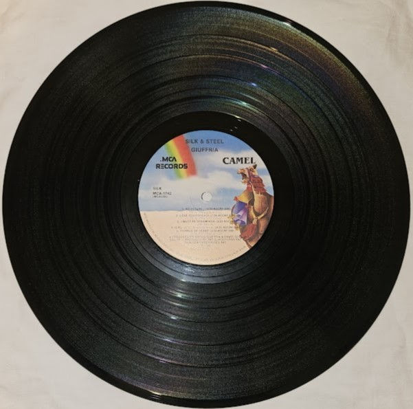 Pikkukuva: Giuffria - Silk + Steel (LP, Album) (MCA Records, Camel (2))