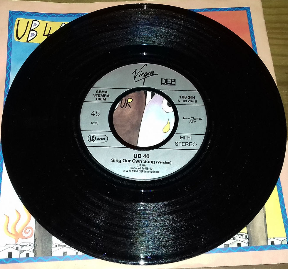 Miniatura: UB40 - Our Own Song (7", Single) (DEP International, DEP International, Virgin,
