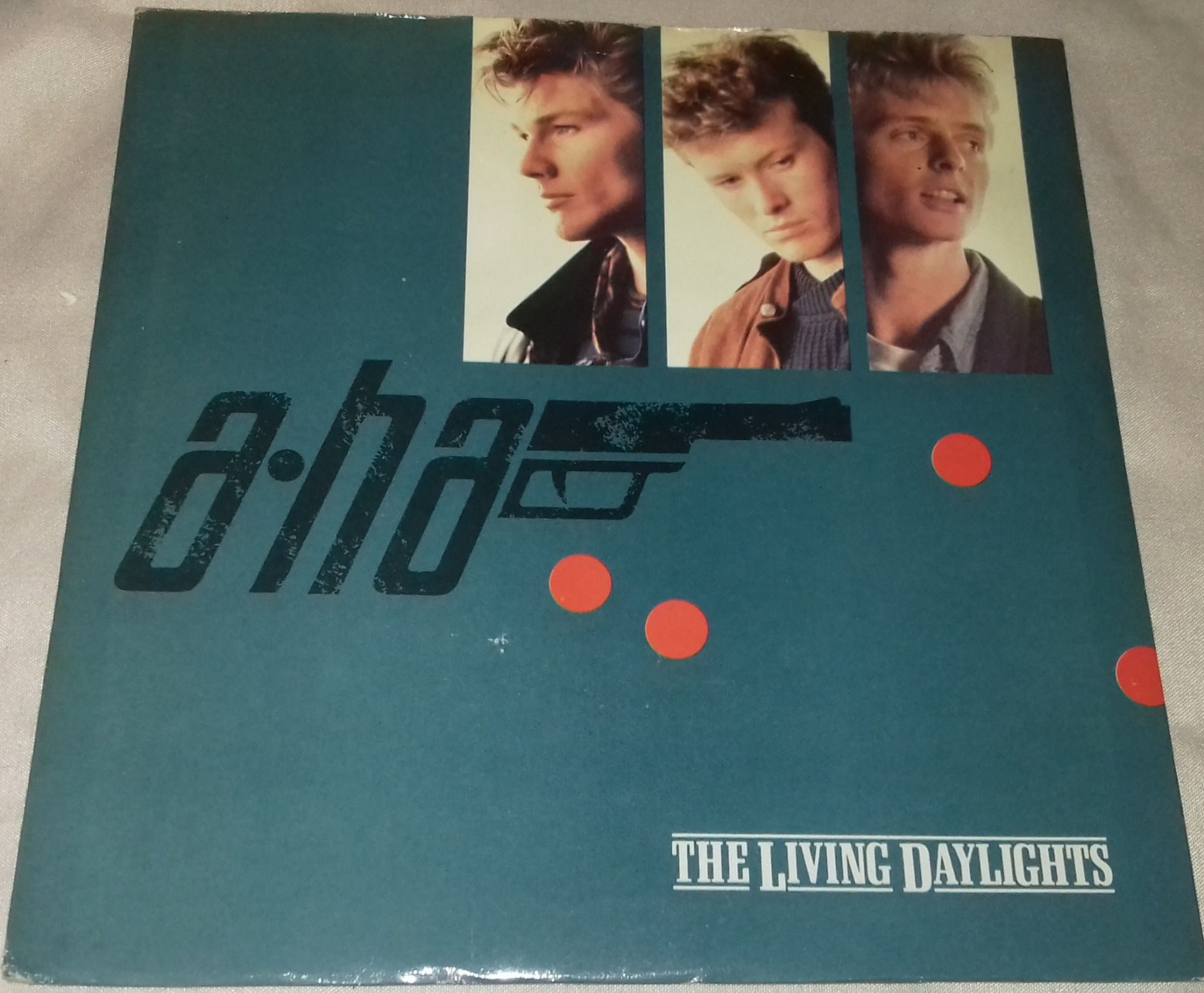 a-ha - The Living Daylights (7", Single, Pap) (Warner Bros. Records, Warner Bros