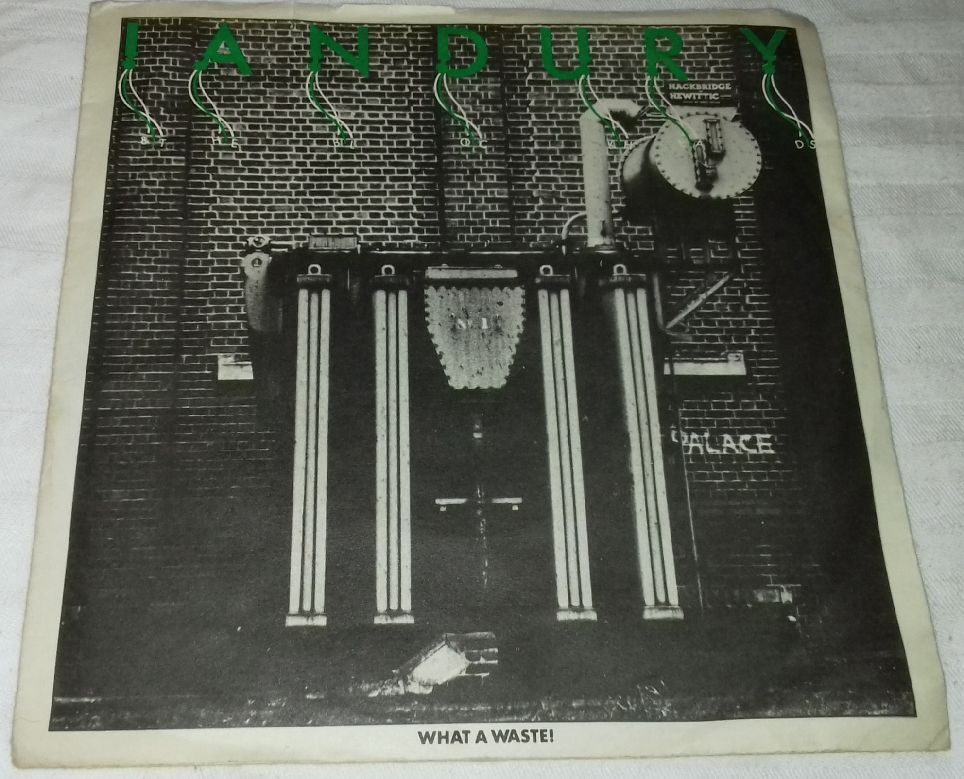 Ian Dury & The Blockheads* - What A Waste! (7", Single) (Stiff Records)