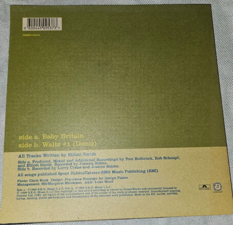Miniatyrbild: Elliott Smith - Baby Britain (7", Single) (Dreamworks Records)