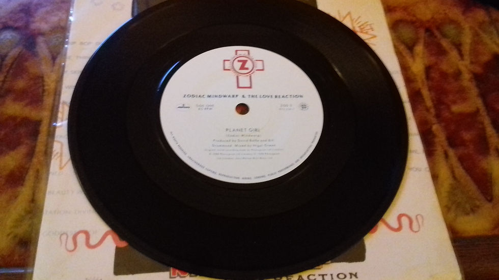 Miniaturbild: Zodiac Mindwarp And The Love Reaction - Planet Girl (7", Single)