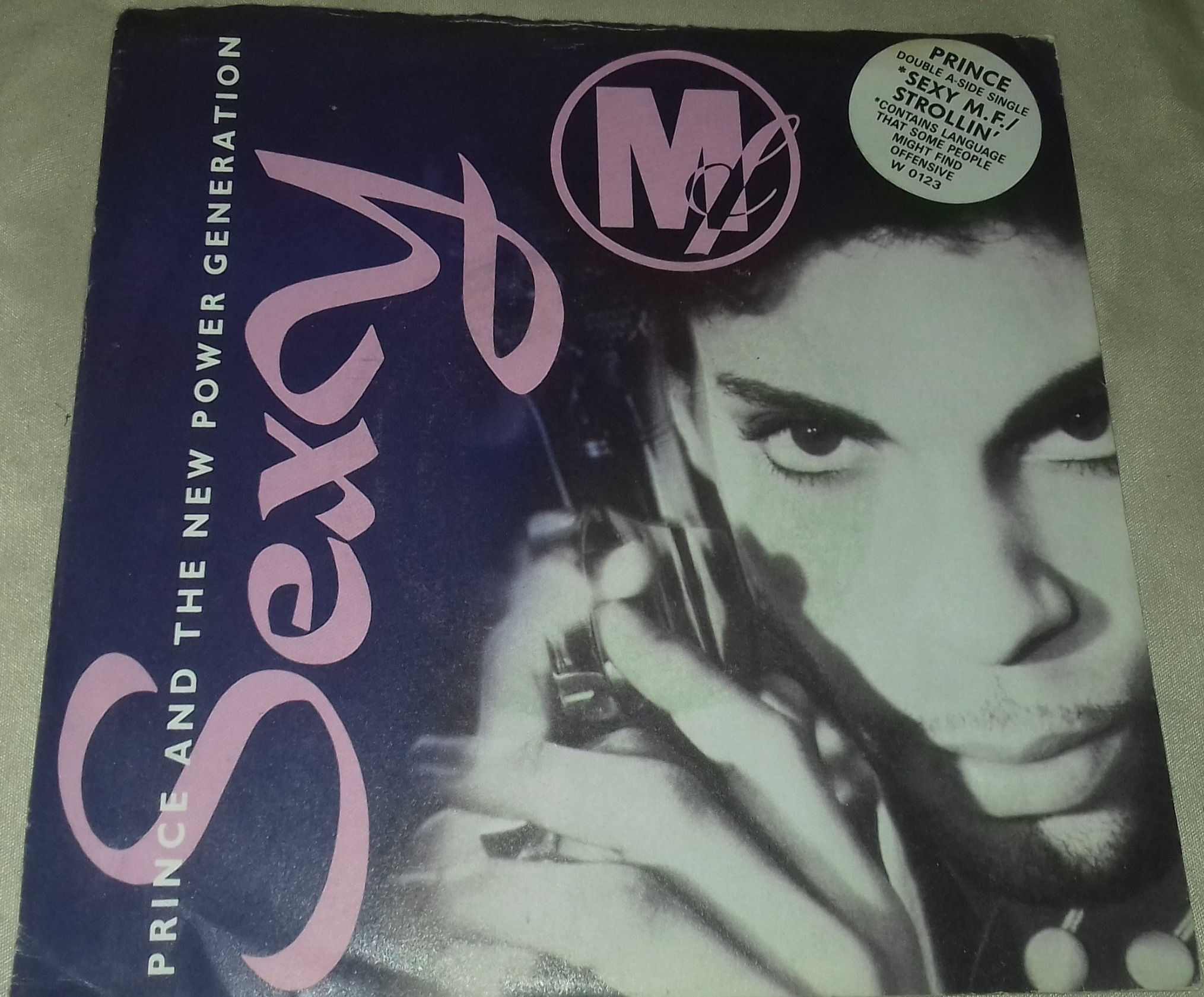 Prince And The New Power Generation - Sexy MF / Strollin' (7", Single, Pap) (War