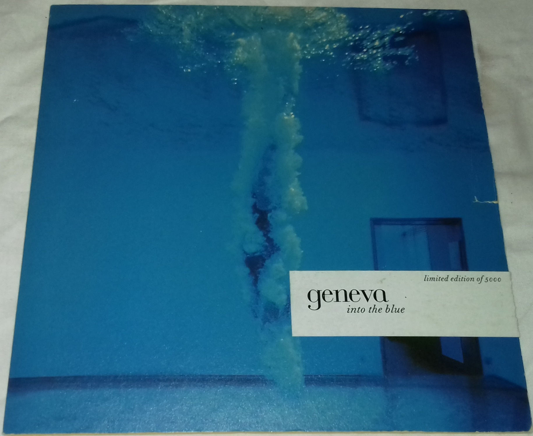 Geneva - Into The Blue (7", Single, Ltd) (Nude Records)