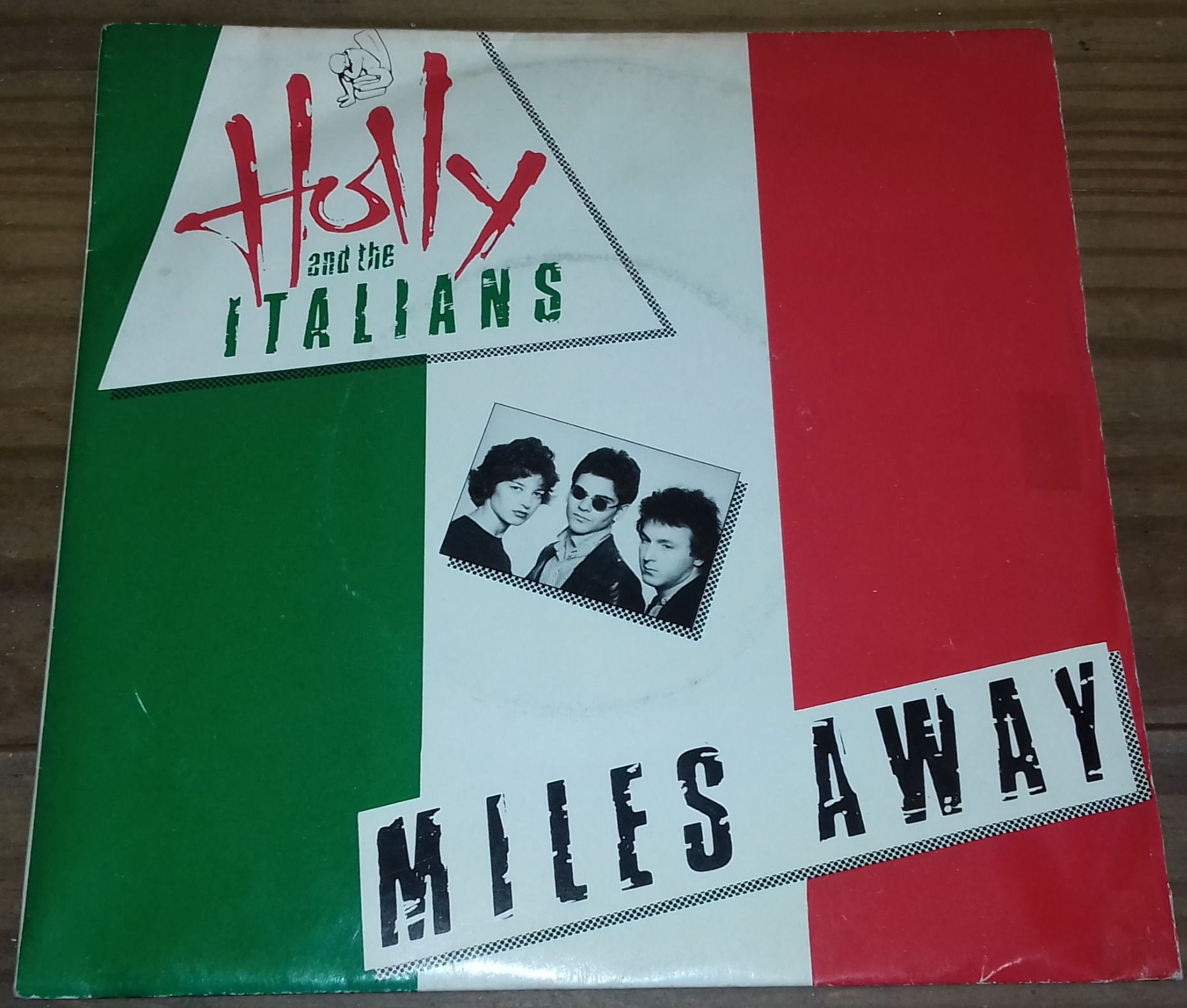 Holly And The Italians - Miles Away (7", Single) (Virgin)