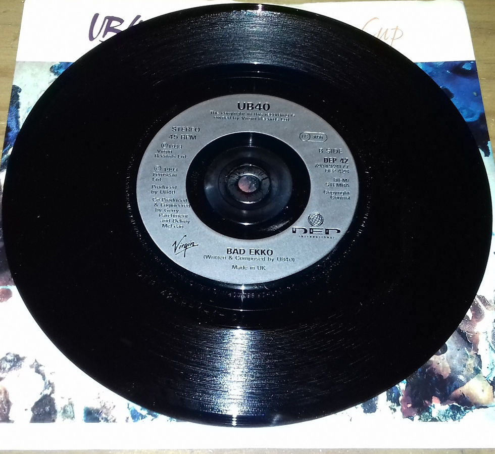 Miniatura: UB40 - Bring Me Your Cup (7", Single) (DEP International, Virgin)