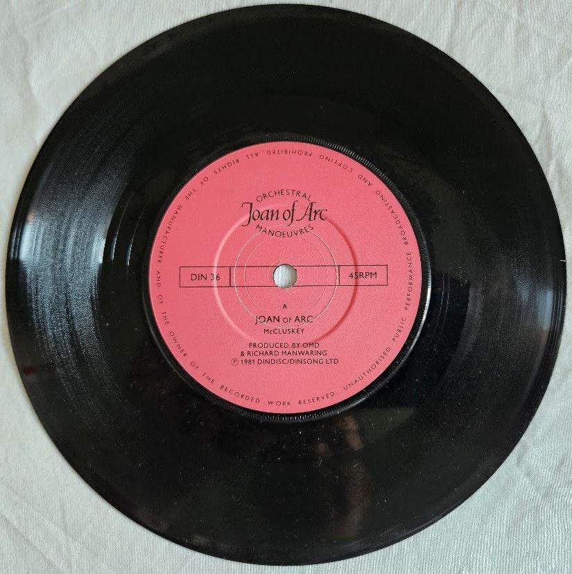 Thumbnail: Orchestral Manoeuvres* - Joan Of Arc (7", Single, Red) (Dindisc)