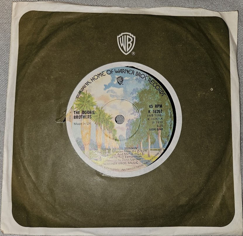 The Doobie Brothers - Long Train Runnin' (7", Single, Sol) (Warner Bros. Records