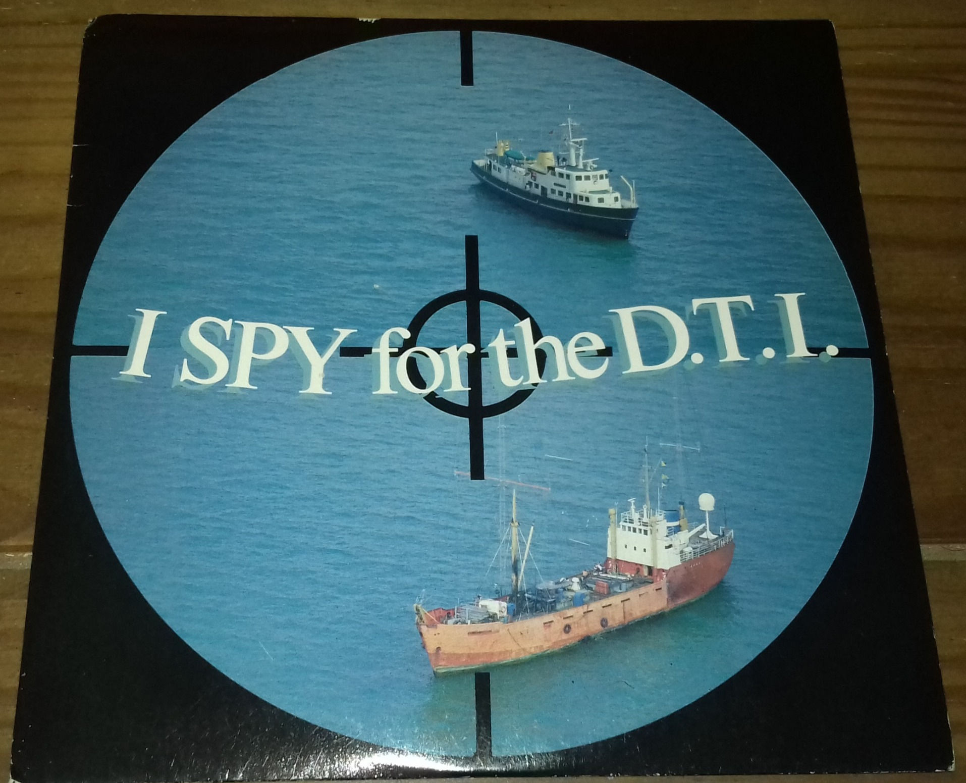 The Moronic Surveyors - I Spy For The D.T.I. (7", Single) (Farce Records)