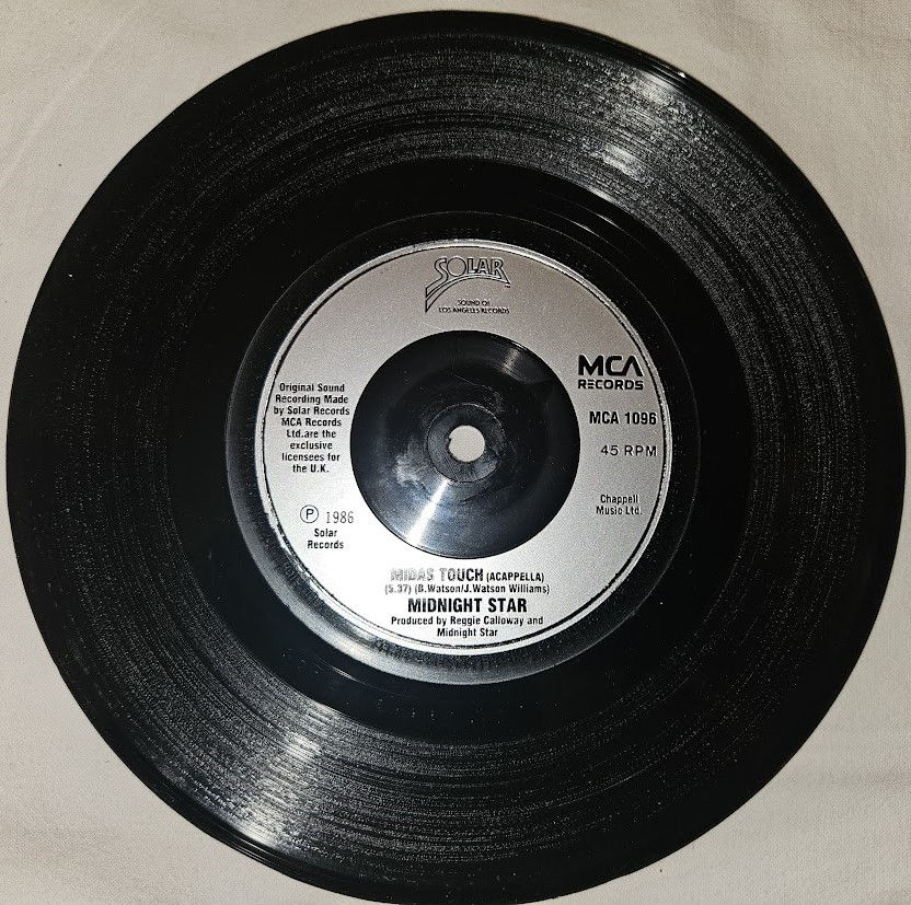 Thumbnail: Midnight Star - Midas Touch (7", Single, Sil) (MCA Records)
