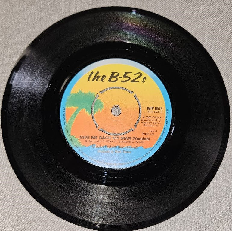 Miniature : The B-52's - Give Me Back My Man (7", Single) (Island Records)