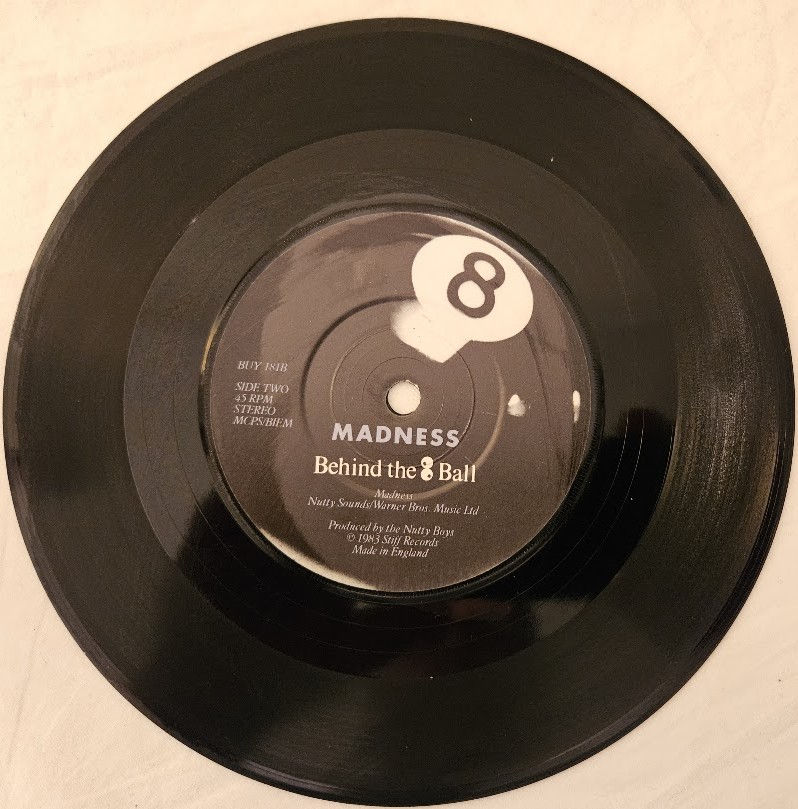 Thumbnail: Madness - Wings Of A Dove (7", Single) (Stiff Records)