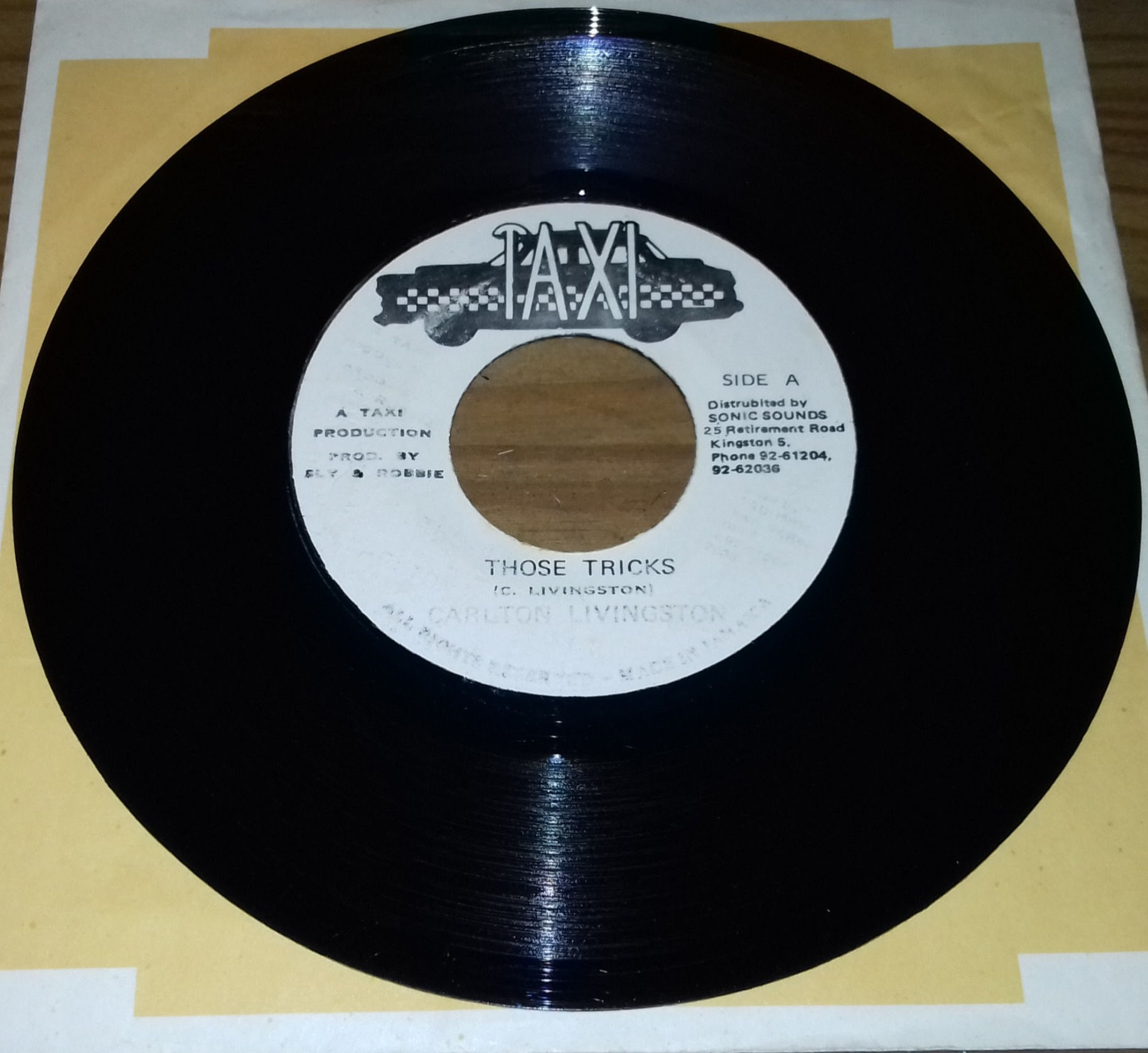 Carlton Livingston / Sly & Robbie - Those Tricks (7", Single) (Taxi)
