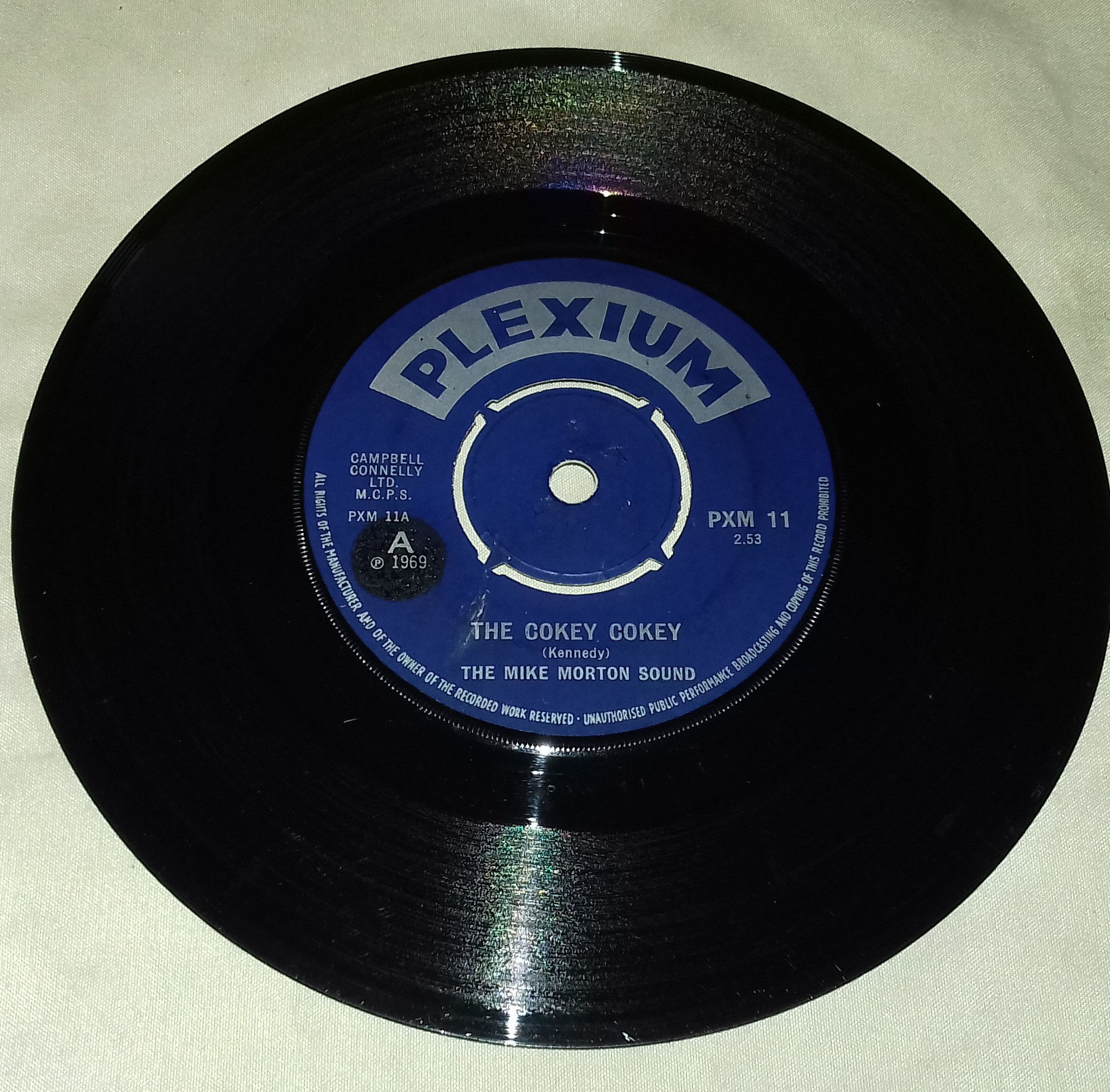 The Mike Morton Sound - The Cokey Cokey (7", Single, Lab) (Plexium)