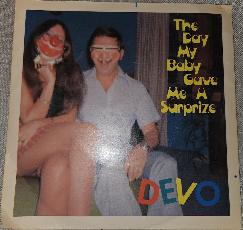 Devo - The Day My Baby Gave Me A Surprize (7", Single) (Virgin)