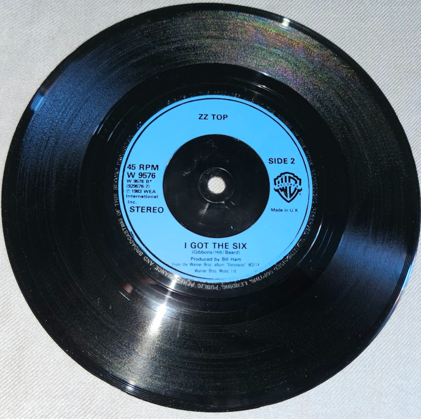 ภาพขนาดย่อ: ZZ Top - Sharp Dressed Man (7", Single, Blu) (Warner Bros. Records, Warner Bros.