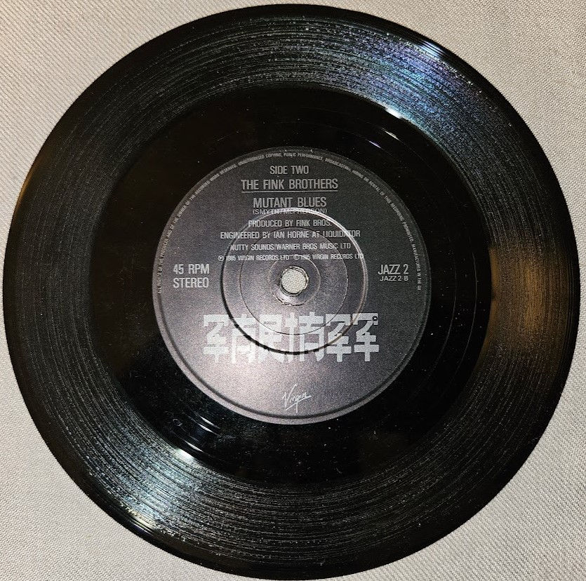 Miniaturbild: The Fink Brothers - Mutants In Mega-City One (7", Single) (Zarjazz, Virgin)